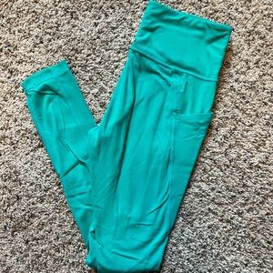 Athleta salutation stash tight